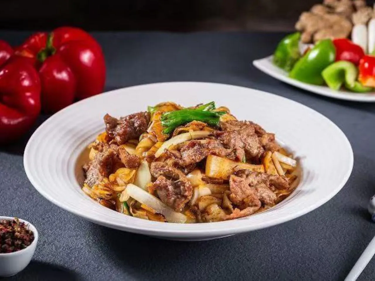 Stir-fried wide rice noodles with beef and onions at New Canton Restaurant, a Chinese Restaurant in San Carlos